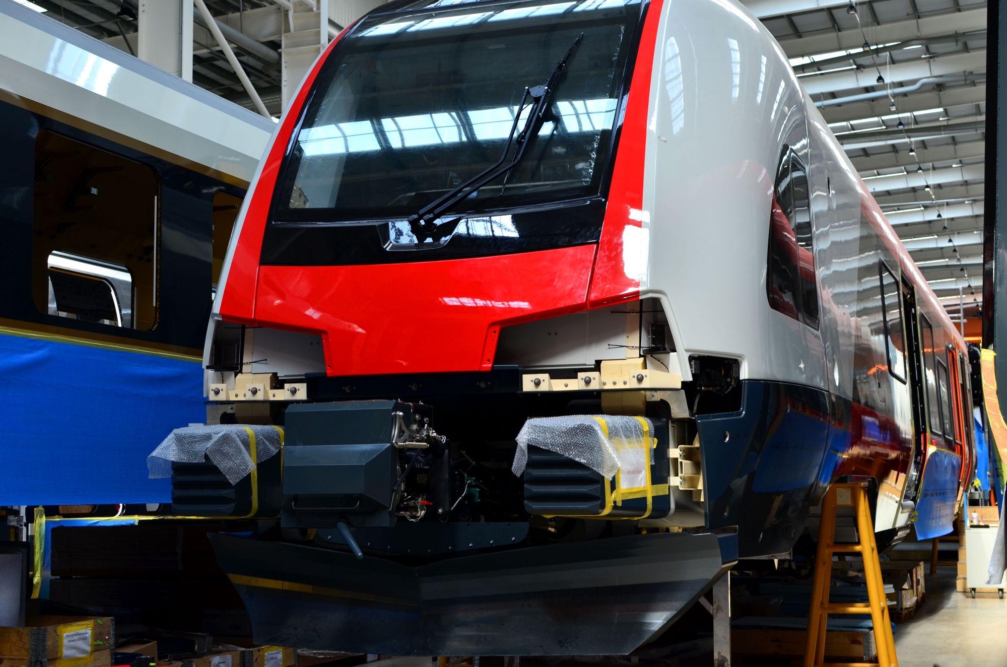 A passenger express train on an assembly plant