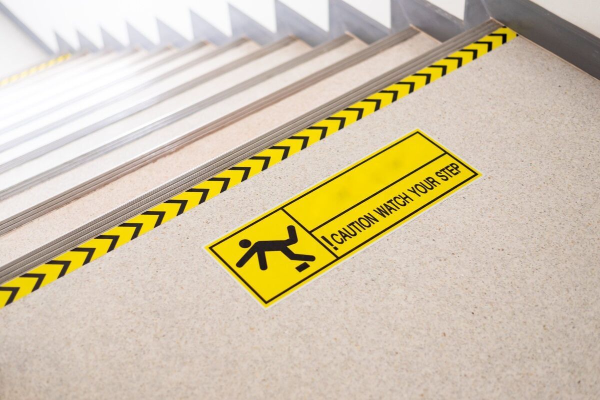 ohs-management-system-dqs-caution watch your step warning sign note stairs safety